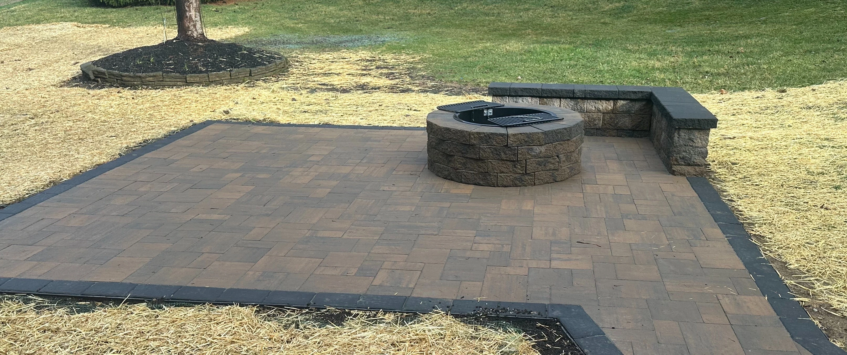 Outdoor atio with fire pit and seating wall Exton, PA.