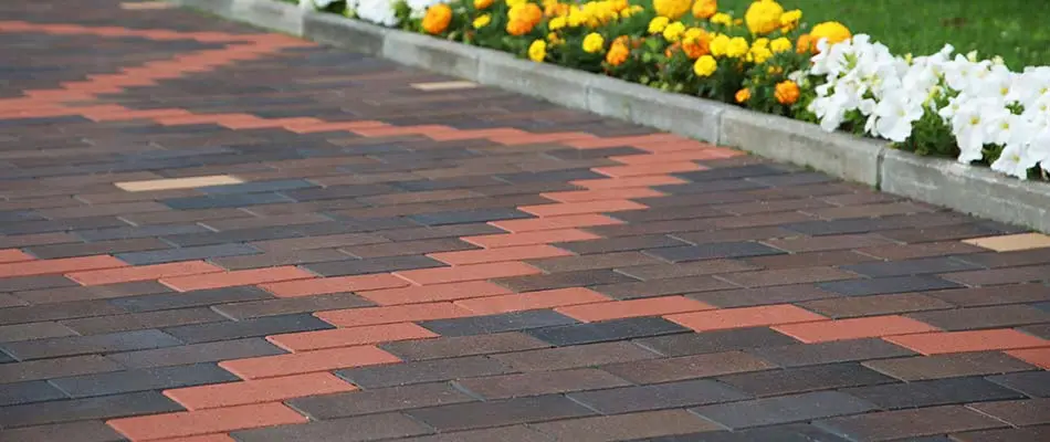 Decorative, cross-pattern driveway design at a home in Malvern, PA.