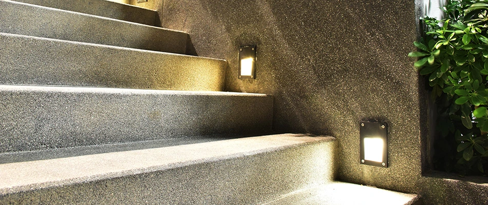 Concrete steps installed alongside LED lights behind a home in West Chester, PA.